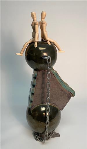 Mario Tagaras, grade 12, Title: Closed Minds Are A Ball & Chain to Common Ground